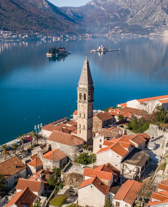 Perast old town and its bell tower from above